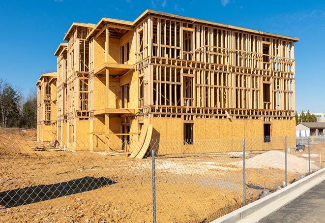 a snapshot of temporary chain link fences protecting a large construction project from unauthorized access in Fillmore